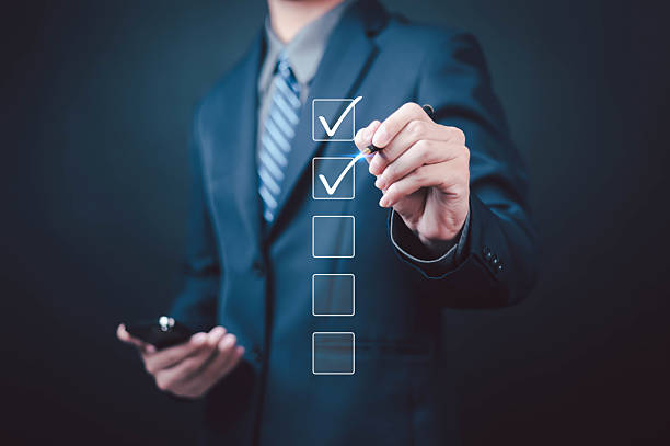 istock Businessman checking checkbox, Business performance checklist concept, Survey, Check off checklist, Fill out online form, Document management system, DMS, Performance appraisal 2222378775