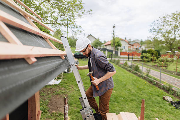 istock Construction Worker Descending Ladder After Completing Work on Wood Frame House 2222379820