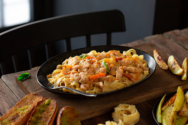istock Chicken meal with cream and grilled vegetables. 2222379965