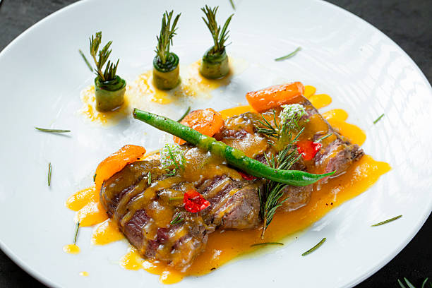 istock Beef steak with apricot sauce. 2222379989