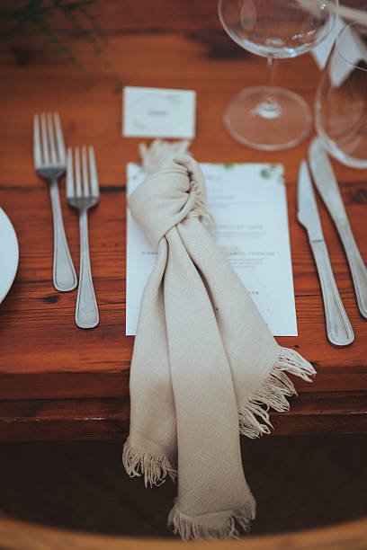 istock Elegant Table Setting With Cream Napkin and Menu on Rustic Wooden Table 2222385972