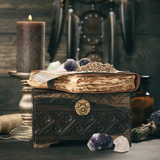 istock Vintage Chest with Journal and Candlelight Ambiance 2222387468