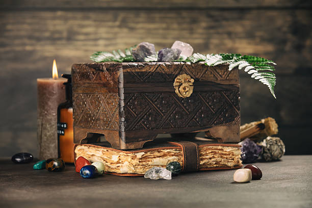 istock Rustic Wooden Chest with Crystals and Vintage Journal 2222387479