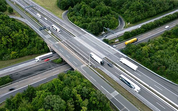 istock Aerial view of highway interchange with vehicles. 2222388391