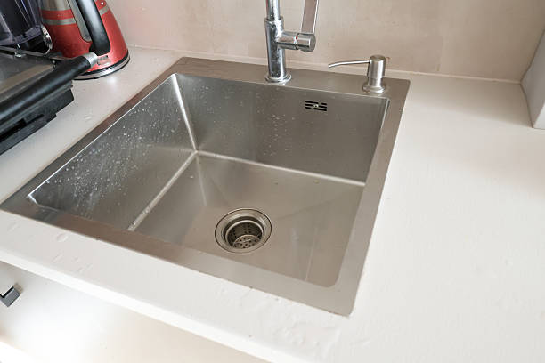 istock Cleaning Process of a Dirty Kitchen Sink 2222391311
