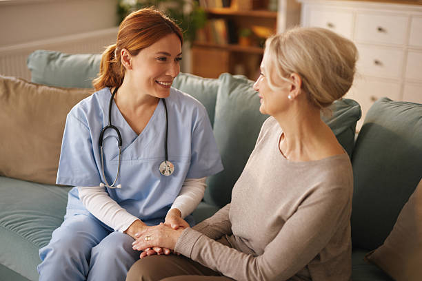istock Caring nurse providing supportive home care 2222392645