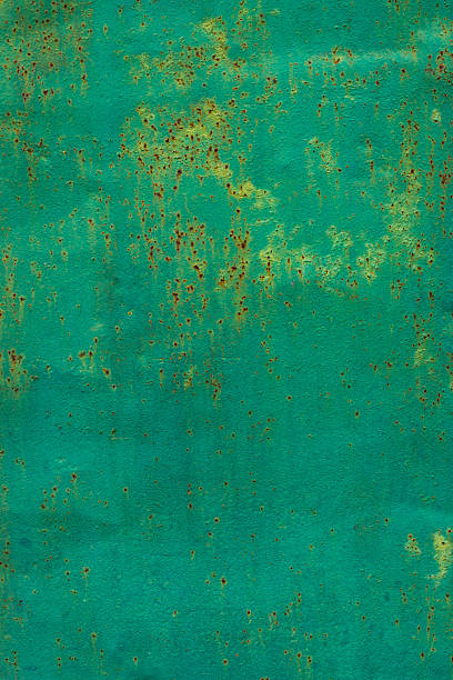 istock Rusted metal surface texture showing weathered paint outdoors 2222394956