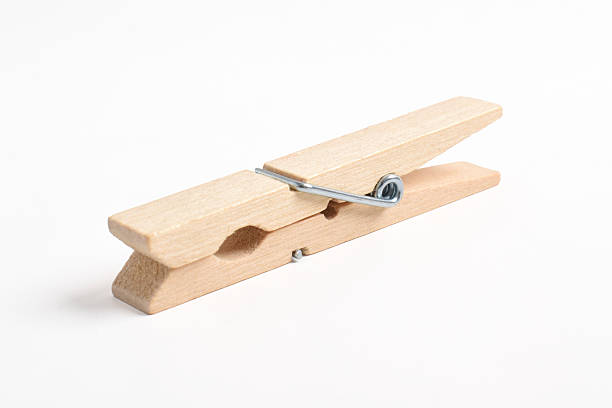 istock Wooden clothes pin on white background 2222395335