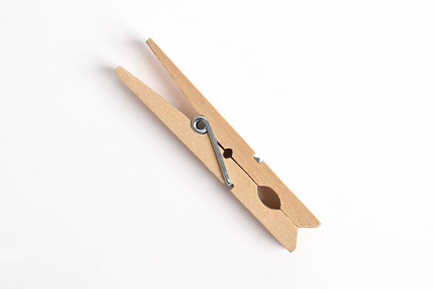 istock Wooden clothes pin on white background 2222395447