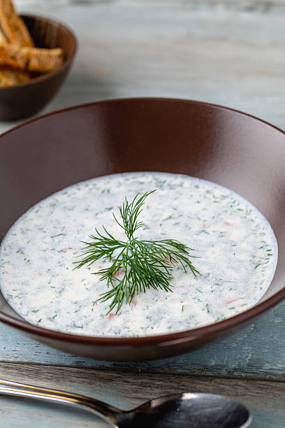 istock Cold yogurt soup with cucumber, dill, and fresh herbs 2222395460