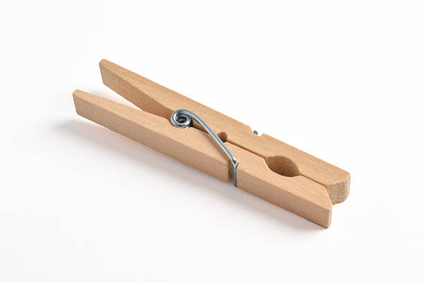 istock Wooden clothes pin on white background 2222395461