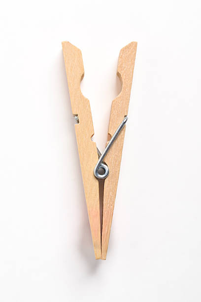 istock Wooden clothes pin on white background 2222395511