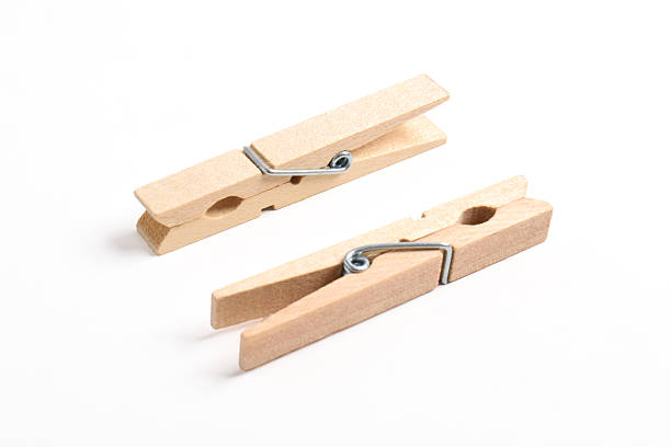 istock Wooden clothes pin on white background 2222395667