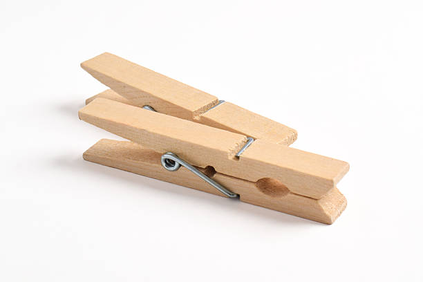 istock Wooden clothes pin on white background 2222395727