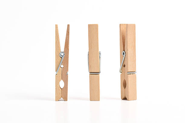 istock Wooden clothes pin on white background 2222395979