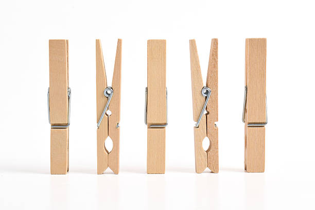 istock Wooden clothes pin on white background 2222396135