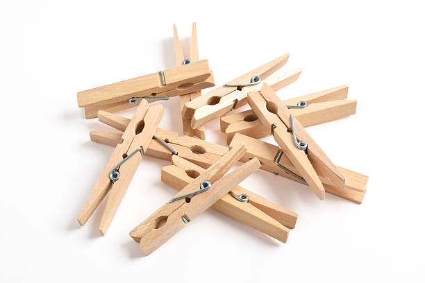 istock Wooden clothes pin on white background 2222396365