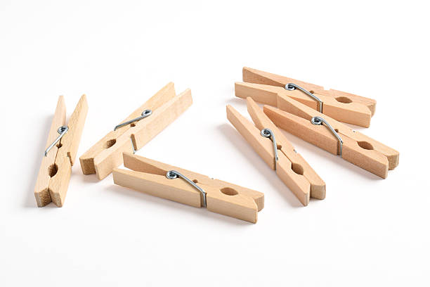 istock Wooden clothes pin on white background 2222396612