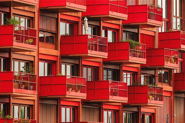 istock modern red facade with cubic balconies 2222398209