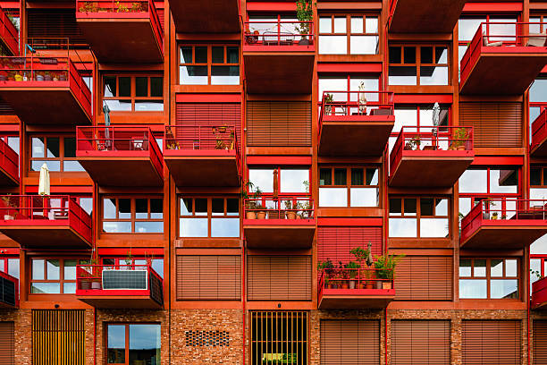 istock modern red facade with cubic balconies 2222398238