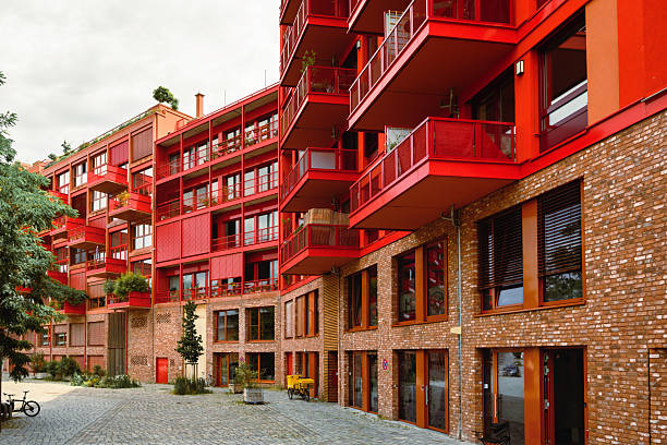 red facades with cubic balconies of new residential architecture in Berlin