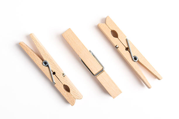 istock Wooden clothes pin on white background 2222398464