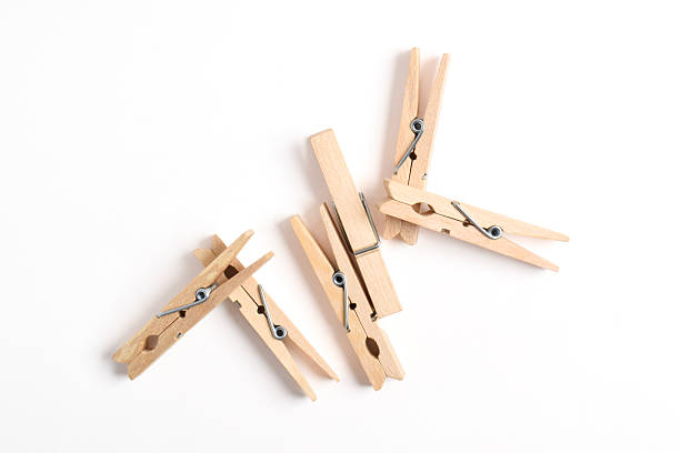 istock Wooden clothes pin on white background 2222398647