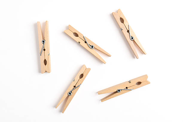 istock Wooden clothes pin on white background 2222398713