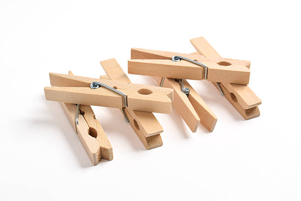 istock Wooden clothes pin on white background 2222398776