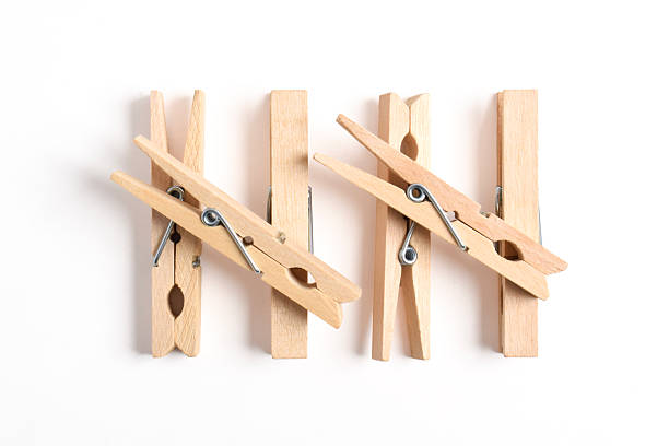 istock Wooden clothes pin on white background 2222398789