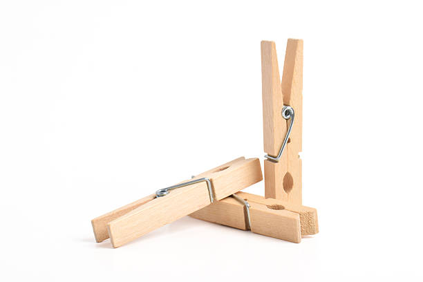 istock Wooden clothes pin on white background 2222399057