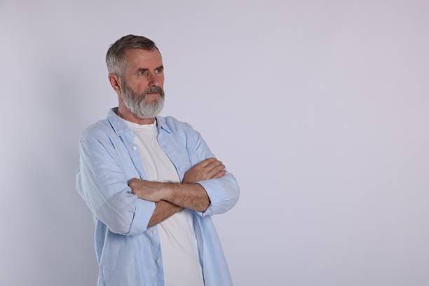 istock Portrait of senior man on white background, space for text 2222405290