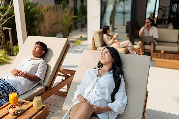 istock Family relaxing while parents unwind nearby 2222418415