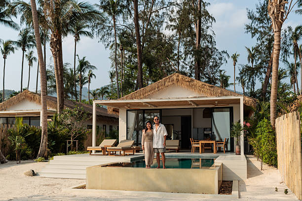 istock Romantic Couple Relaxing in Luxury Beachfront Villa, in Thailand 2222421311