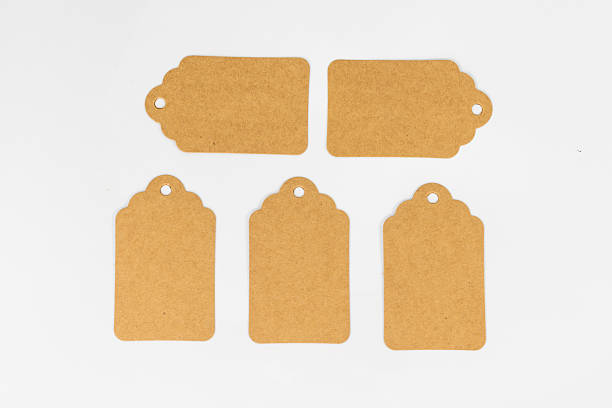 istock Five Blank Brown Paper Tags on White Isolated Background 2222421474