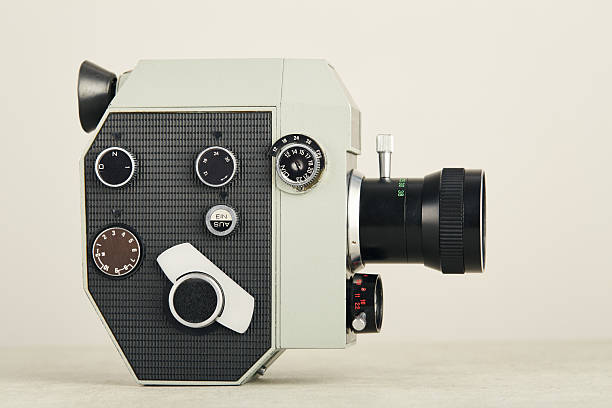 istock Old fashioned analog 8mm film movie camera on white background 2222423742