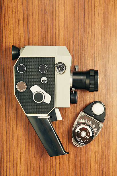 Analog film equipment. Old movie camera and a light meter