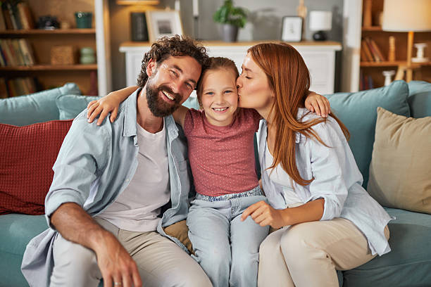 istock Happy family sharing a loving moment at home 2222425231