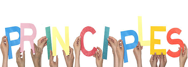 istock Hands Holding Colorful Letters Forming the Word Principles on White Background 2222442367