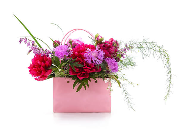 istock Flowers and a women's bag. 2222442823