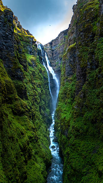 istock Glymur waterfall cascading through steep green cliffs in Icelands stunning landscape 2222447434