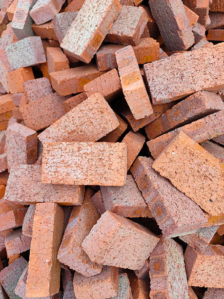 istock Pile of red bricks on a construction site 2222449153