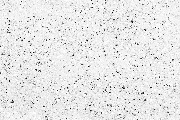 istock High-resolution seamless photo of a white textured surface with black speckles 2222456765