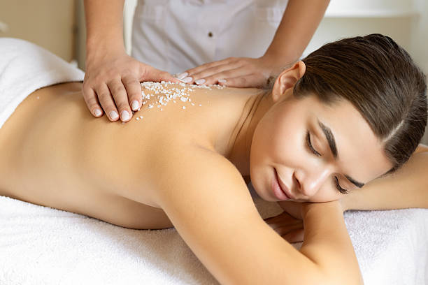 istock Female getting mineral salt massage 2222459769