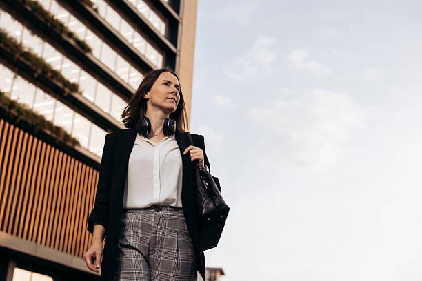 istock Businesswoman rushing to work 2222460042