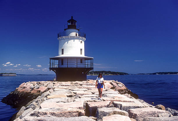 istock Portland Maine - Woman & Spring Point Ledge Light - 1985 2222460315