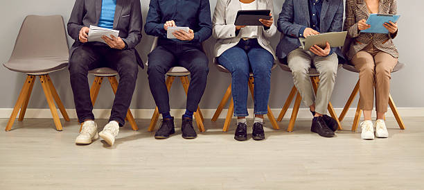 istock People using laptop and tablet computers while waiting for business meeting or job interview 2222461117