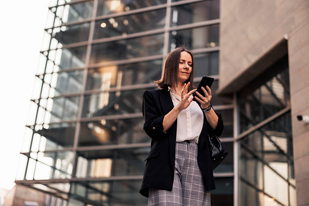 istock Businesswoman using phone and going to job 2222466065