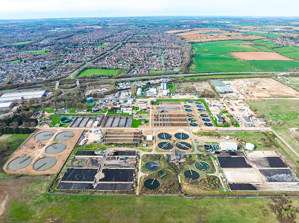 istock Water treatment plant seen from above with drone in england 2222467802