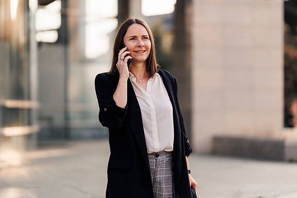 istock Businesswoman using phone and going to job 2222468138
